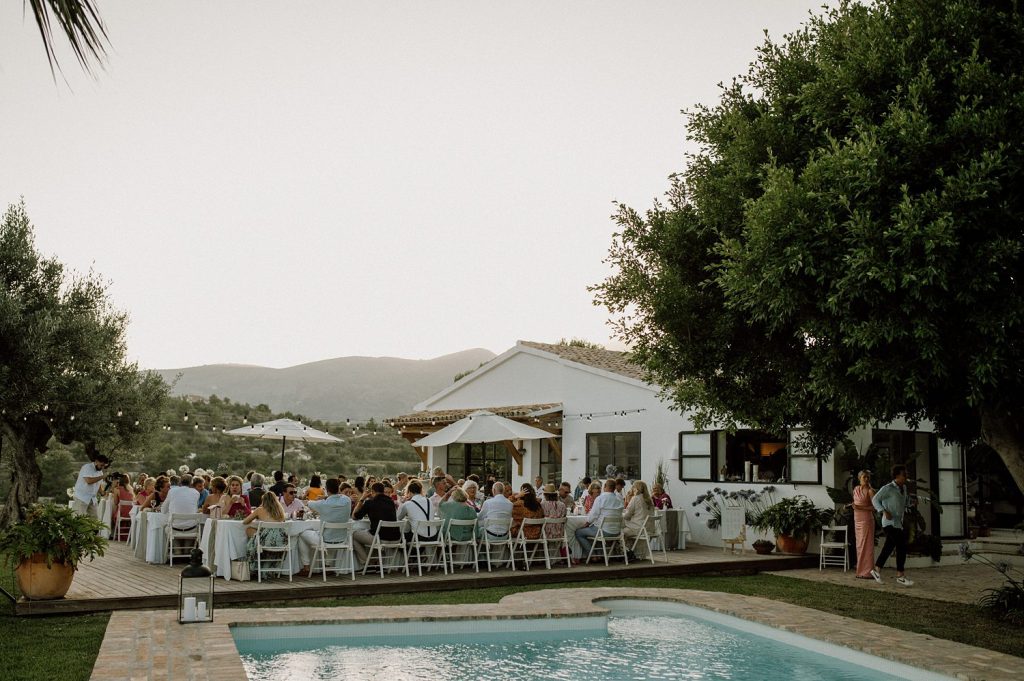 Dinner at sunset during a wedding at a private villa in Benissa near a pool and surrounded by mountains