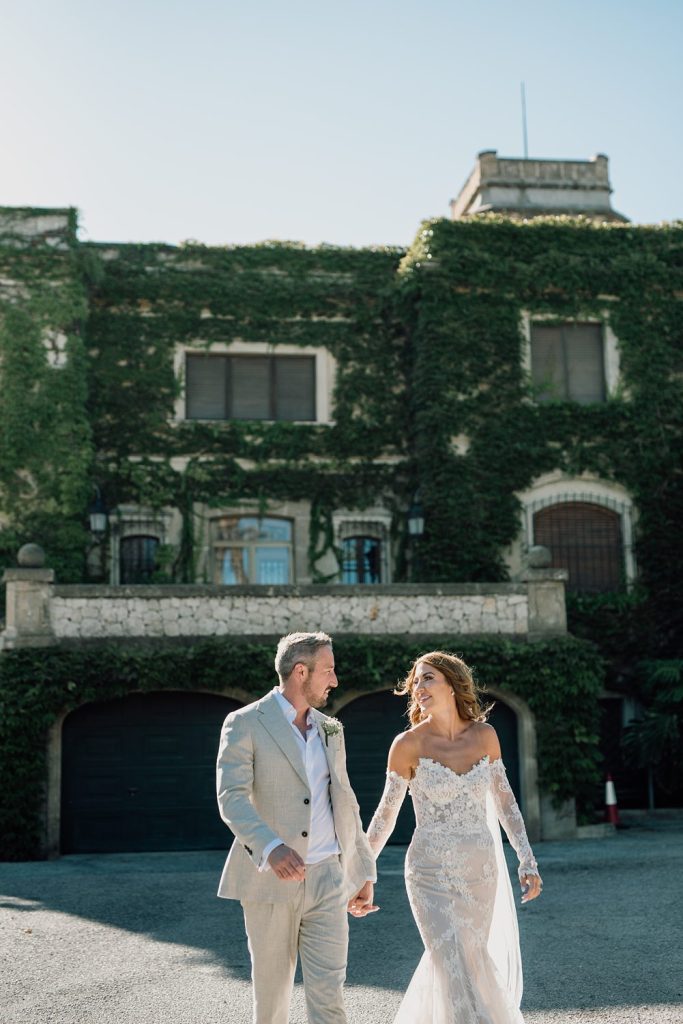 Couple walking in a beautiful outdoor setting.